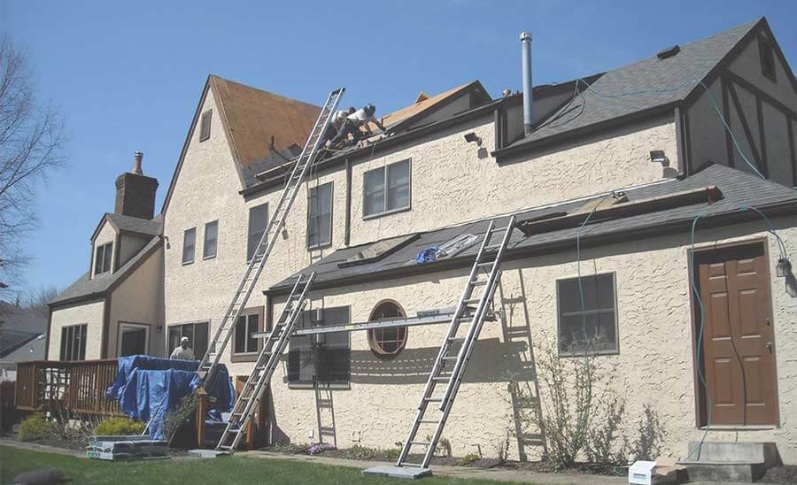 How are roofing costs estimated?