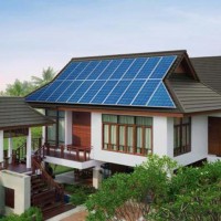 Dutch Gable (Hip) Roof with metal shingles and solar panels